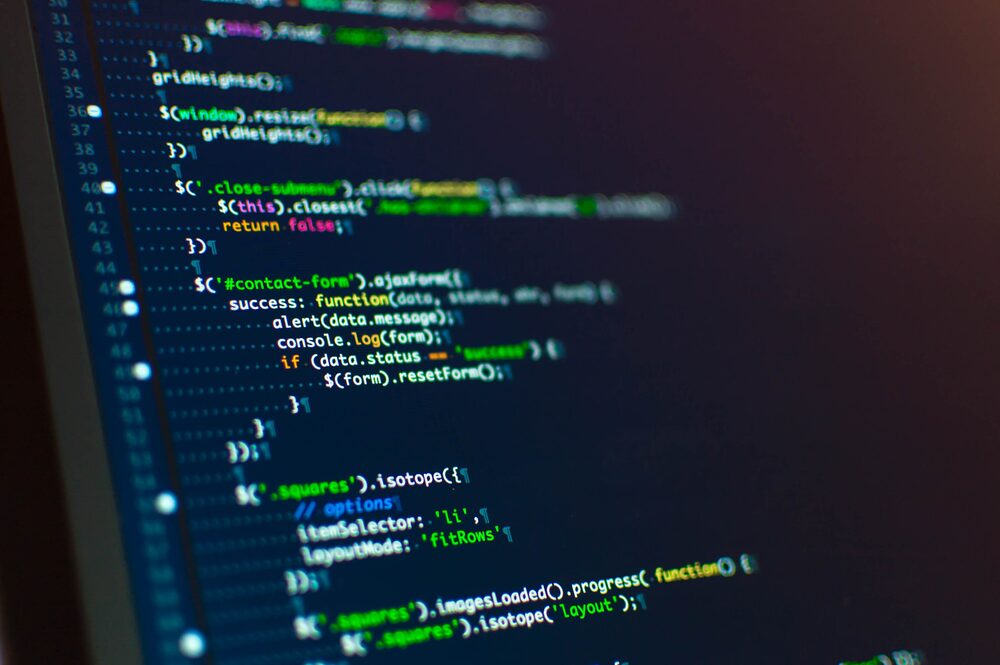Close-up of computer screen showing colorful code for a SharePoint REST API upsert function