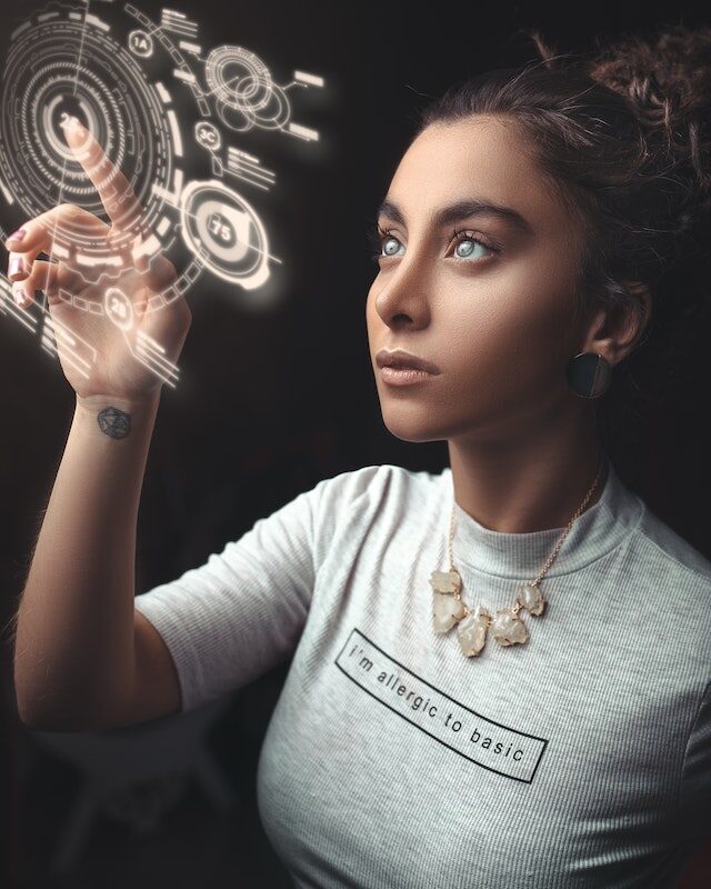 woman interacting with digital hologram representing Microsoft 365 user setup